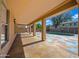 Covered patio boasts a decorative concrete floor and multiple support columns at 13569 W Ventura St, Surprise, AZ 85379