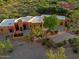 An aerial view of a property featuring a circular drive at 1489 Thrasher Ln, Wickenburg, AZ 85390