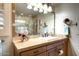 Bathroom featuring updated lighting, sink, vanity and walk in shower at 1489 Thrasher Ln, Wickenburg, AZ 85390