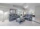 Inviting living room with tile floors and comfortable leather sofas at 1601 E Elgin St, Chandler, AZ 85225