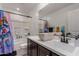 Bright bathroom with shower-tub combination and a single sink at 16846 W Molly Ln, Surprise, AZ 85387