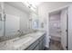Bathroom featuring double vanity with granite countertop and modern fixtures at 17989 W Camino De Oro --, Surprise, AZ 85387
