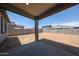 Spacious backyard featuring a covered patio at 17996 W Camino De Oro --, Surprise, AZ 85387