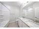 Bathroom featuring a double vanity with a solid surface countertop at 17996 W Camino De Oro --, Surprise, AZ 85387