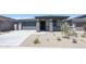 Lovely single-story home with stone pillar accents and a well-maintained front yard at 17996 W Camino De Oro --, Surprise, AZ 85387