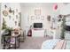 Bright bedroom featuring a desk, vanity, and a charming collection of personal decor at 21150 W Minnezona Ave, Buckeye, AZ 85396