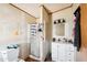 Small bathroom with a stand-up shower, white vanity, and a mirrored wall at 21621 W Narramore Rd, Buckeye, AZ 85326