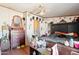 This bedroom features a large bed, a ceiling fan and dressers at 21621 W Narramore Rd, Buckeye, AZ 85326