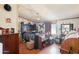 This bedroom features a large bed, a ceiling fan and colorful decor at 21621 W Narramore Rd, Buckeye, AZ 85326