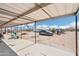 Covered patio view highlighting a spacious, desert landscape at 21621 W Narramore Rd, Buckeye, AZ 85326