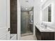 Modern bathroom featuring a walk-in shower and a sleek vanity at 2211 E Camelback Rd # 601, Phoenix, AZ 85016