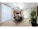 Well-lit conference room with modern chairs, large table, and minimalist design at 2211 E Camelback Rd # 601, Phoenix, AZ 85016