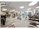 Well-equipped gym with mirrored wall, exercise machines, and ample natural light at 2211 E Camelback Rd # 601, Phoenix, AZ 85016