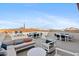 Elegant roof deck boasts stylish outdoor furniture, ideal for entertaining and enjoying panoramic city views at 2211 E Camelback Rd # 601, Phoenix, AZ 85016