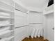 Walk-in closet with custom shelving for ample storage space at 2211 E Camelback Rd # 601, Phoenix, AZ 85016