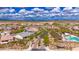 Expansive aerial view of the beautiful community with mountain views, lush landscaping, and well-maintained homes at 22426 N 29Th Pl, Phoenix, AZ 85050