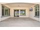 Spacious covered patio with tiled flooring, recessed lighting, ceiling fan, and tv at 22426 N 29Th Pl, Phoenix, AZ 85050