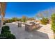 Backyard showcasing outdoor kitchen with built in grill, stone accents, and open patio at 22426 N 29Th Pl, Phoenix, AZ 85050