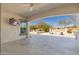 Inviting covered patio leading to an outdoor living area with a fire pit, seating, and dining space at 22426 N 29Th Pl, Phoenix, AZ 85050