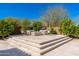 Elegant tiered patio with refined outdoor seating, perfect for entertaining with a scenic desert view at 22426 N 29Th Pl, Phoenix, AZ 85050