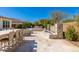 Beautiful outdoor space featuring a gas fire pit, stylish seating, and stone accents for relaxation at 22426 N 29Th Pl, Phoenix, AZ 85050