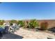 The backyard includes beautiful desert landscaping at 3025 S Copperwood --, Mesa, AZ 85212