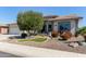 Charming single-story home with desert landscaping and a well-manicured front yard at 3025 S Copperwood --, Mesa, AZ 85212