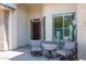 Inviting front porch with seating area, perfect for relaxing and enjoying the outdoors at 3025 S Copperwood --, Mesa, AZ 85212