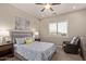 Serene main bedroom with a window view, soft lighting, and comfortable seating area at 3025 S Copperwood --, Mesa, AZ 85212