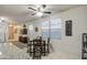 Cozy kitchen breakfast nook with natural light streaming through the windows and view into the living room at 30945 W Picadilly Rd, Buckeye, AZ 85396