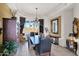 Elegant dining room with sophisticated decor, chandelier, and mountain views at 35345 N Canyon Creek Ct, Carefree, AZ 85377