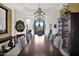 Formal dining room with coffered ceilings, chandelier, and ample seating for entertaining at 35345 N Canyon Creek Ct, Carefree, AZ 85377