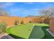 Private putting green with desert views, perfect for the golf enthusiast at 35345 N Canyon Creek Ct, Carefree, AZ 85377