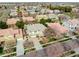 Overhead view displaying a neighborhood home with tile roof, established landscaping, and a driveway at 3744 E Sierra Madre Ave, Gilbert, AZ 85296