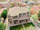 Aerial view of a beautiful home featuring a well-maintained roof and manicured lawn in a residential neighborhood at 3744 E Sierra Madre Ave, Gilbert, AZ 85296