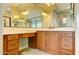 Bathroom vanity with ample storage and a large mirror at 3744 E Sierra Madre Ave, Gilbert, AZ 85296