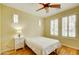 Cozy bedroom with wood floors and natural light at 3744 E Sierra Madre Ave, Gilbert, AZ 85296