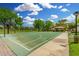 Community basketball court with well-maintained surface and hoops, perfect for recreation at 4186 E Jasper Dr, Gilbert, AZ 85296