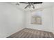 Neutral bedroom featuring carpet floors, a ceiling fan and window with blinds at 4186 E Jasper Dr, Gilbert, AZ 85296