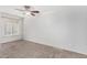 Clean, bright bedroom with neutral carpet and natural light at 4186 E Jasper Dr, Gilbert, AZ 85296