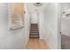 Light and bright entryway featuring wood floors and a staircase leading upstairs at 4186 E Jasper Dr, Gilbert, AZ 85296