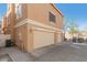 A view of the house including a multi-car garage and private driveway at 4186 E Jasper Dr, Gilbert, AZ 85296