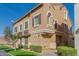 Charming multi-story house with manicured lawn and blue skies at 4186 E Jasper Dr, Gilbert, AZ 85296