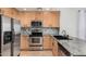 Close-up of kitchen with stainless steel appliances and granite countertops at 4186 E Jasper Dr, Gilbert, AZ 85296