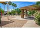 Community park featuring picnic benches, a covered gazebo, lush landscaping, and a play area at 4186 E Jasper Dr, Gilbert, AZ 85296