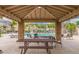 Shaded poolside pavilion with picnic tables overlooking the community pool at 4186 E Jasper Dr, Gilbert, AZ 85296