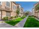 Street view of a manicured community with well-maintained lawns at 4186 E Jasper Dr, Gilbert, AZ 85296