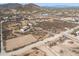 Aerial view of rural property with desert landscape and mountain views at 43228 N 14Th St, New River, AZ 85087