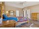 Bright bedroom with a wooden dresser, hard floors, and neutral walls at 43228 N 14Th St, New River, AZ 85087