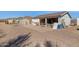 Large garage with open door, storage space, and a cluttered interior at 43228 N 14Th St, New River, AZ 85087